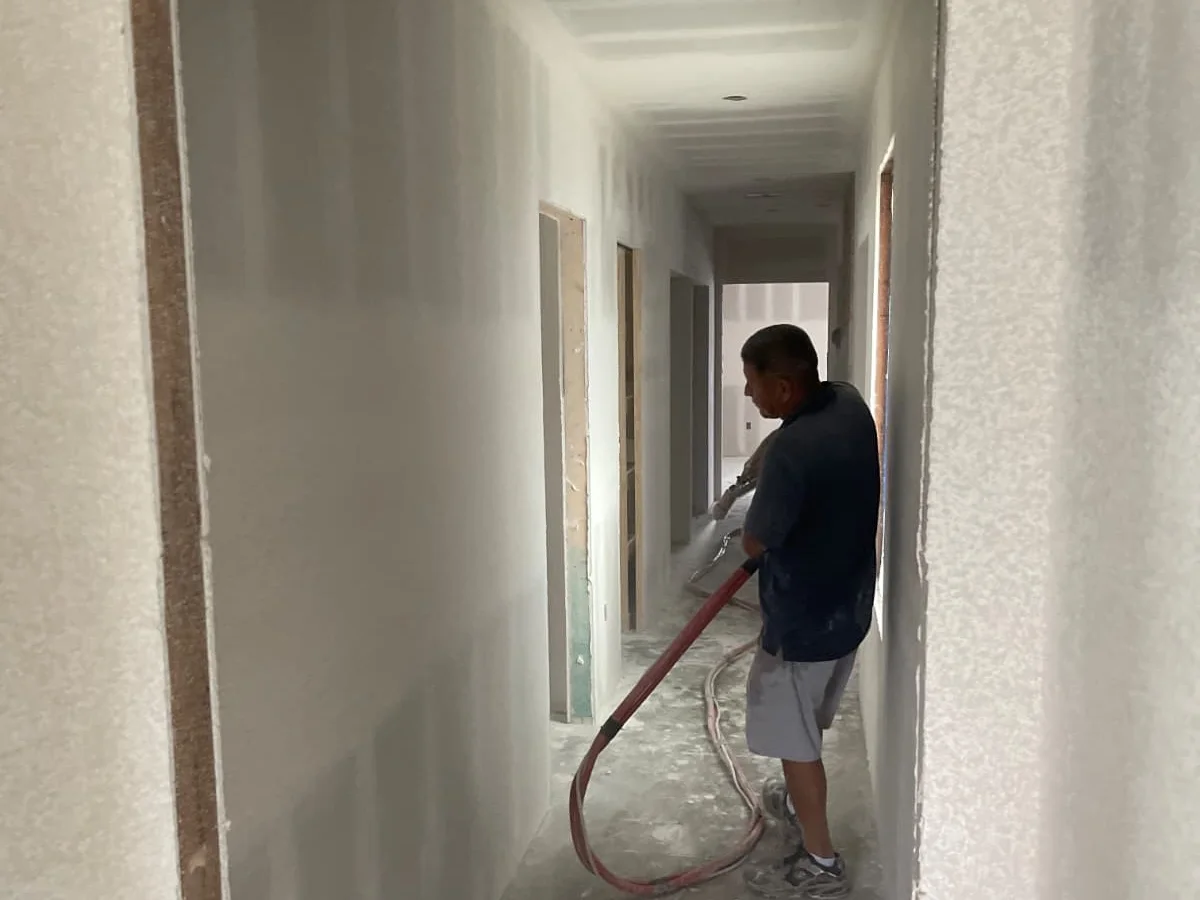 Hallway being textured with a hopper gun